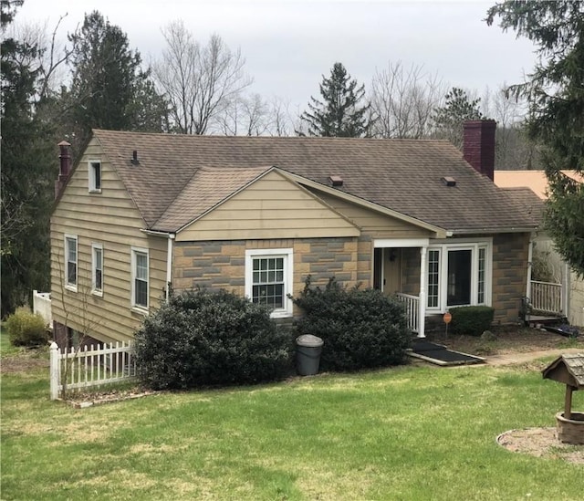 159 Oakville Rd, Chippewa Twp, PA 15010 - rear view of property with stone siding, a chimney, and a shingled roof