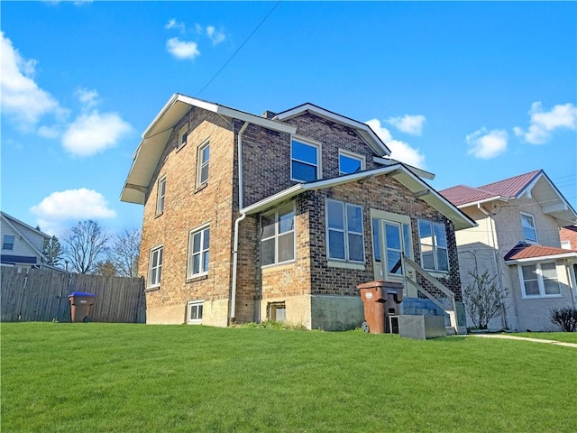 100 Shenango Blvd, Farrell, PA 16121 - exterior space with brick siding, a lawn, and fence