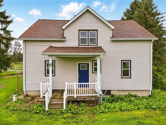 view of front of property with a shingled roof