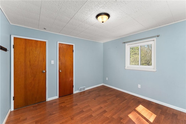 2925 Mcneal Rd, Hampton, PA 15101 - unfurnished room featuring wood finished floors, visible vents, and crown molding