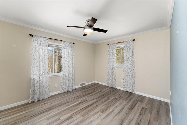 2925 Mcneal Rd, Hampton, PA 15101 - spare room with baseboards, a ceiling fan, wood finished floors, and visible vents