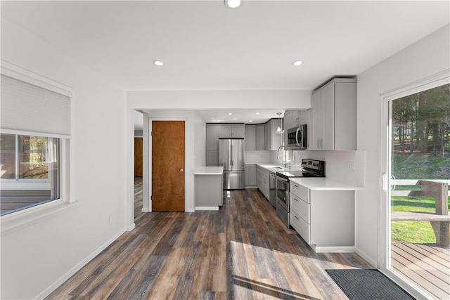 2925 Mcneal Rd, Hampton, PA 15101 - kitchen with a sink, light countertops, dark wood finished floors, appliances with stainless steel finishes, and gray cabinetry