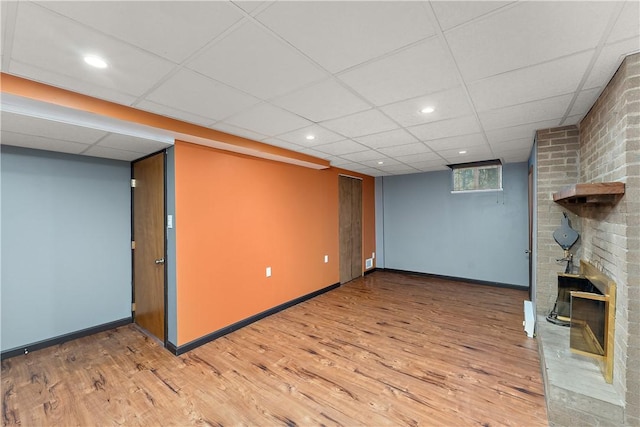 2925 Mcneal Rd, Hampton, PA 15101 - below grade area with baseboards, a paneled ceiling, wood finished floors, and recessed lighting