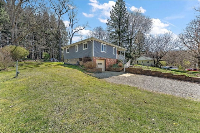 2925 Mcneal Rd, Hampton, PA 15101 - view of side of home featuring a lawn, an attached garage, and driveway