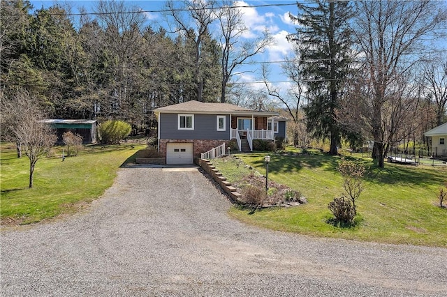 2925 Mcneal Rd, Hampton, PA 15101 - view of front facade with gravel driveway, stairway, a front lawn, and an attached garage