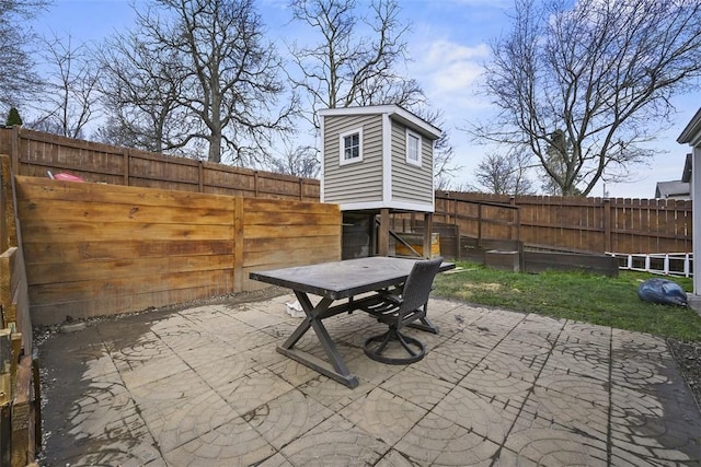 view of patio / terrace with outdoor dining area and a fenced backyard