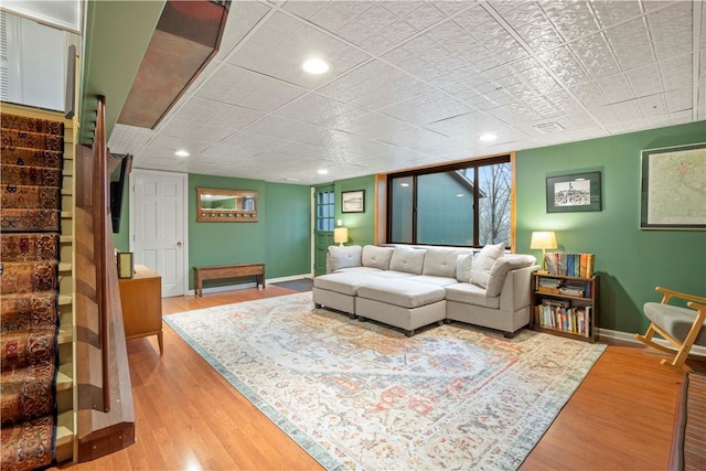 18 Oakglen Dr, Oakmont, PA 15139 - living area featuring baseboards, light wood-type flooring, and stairs