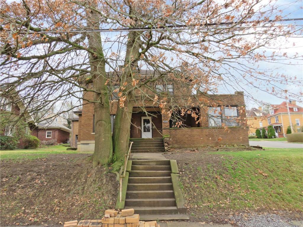 traditional home with brick siding