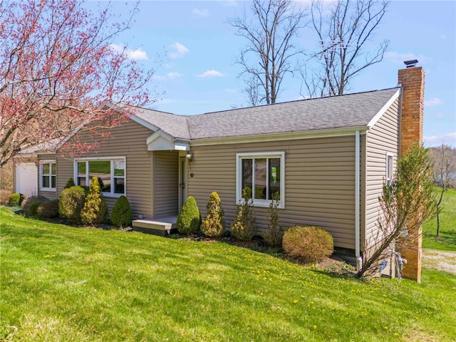320 Parcell St, Claysville, PA 15323 - ranch-style house with a chimney, a front lawn, and a shingled roof