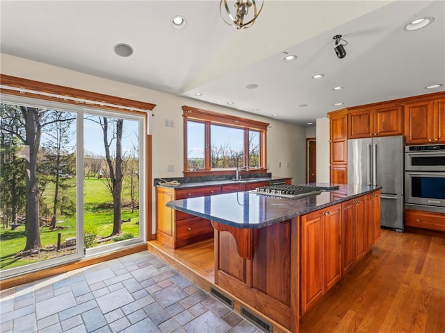 320 Parcell St, Claysville, PA 15323 - kitchen with dark stone countertops, a sink, appliances with stainless steel finishes, a kitchen island, and recessed lighting
