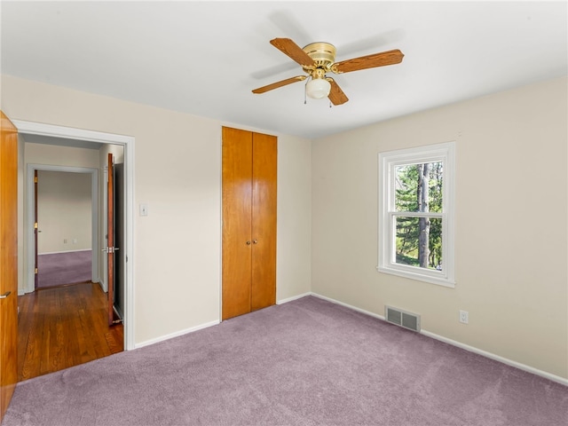 320 Parcell St, Claysville, PA 15323 - unfurnished bedroom with a ceiling fan, a closet, carpet floors, baseboards, and visible vents