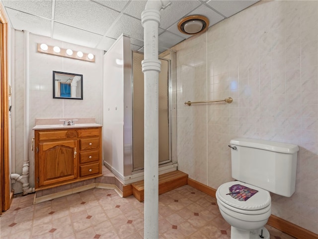 320 Parcell St, Claysville, PA 15323 - full bath featuring tile walls, tile patterned floors, a shower stall, and toilet