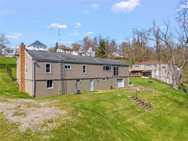 320 Parcell St, Claysville, PA 15323 - rear view of house featuring a shingled roof and a yard