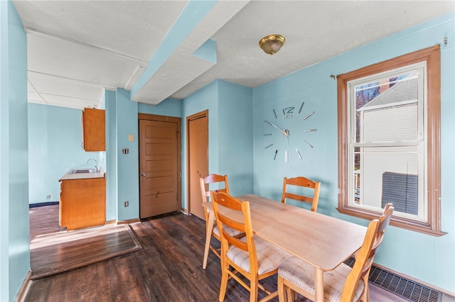 335 Queensbury Steet, Crafton Heights, PA 15205 - dining room featuring dark wood finished floors, a textured ceiling, baseboards, and visible vents