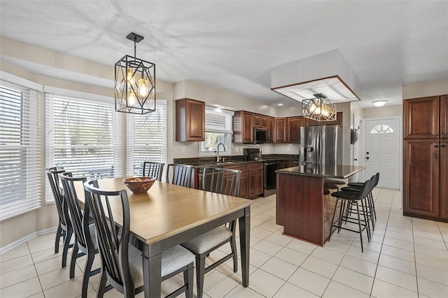 158 Edgemeade Dr, Monroeville, PA 15146 - dining space featuring an inviting chandelier, baseboards, and light tile patterned floors
