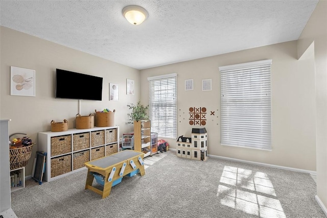 158 Edgemeade Dr, Monroeville, PA 15146 - rec room featuring carpet floors, a textured ceiling, and baseboards