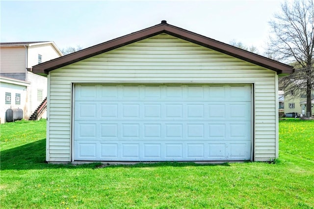 detached garage featuring heating fuel