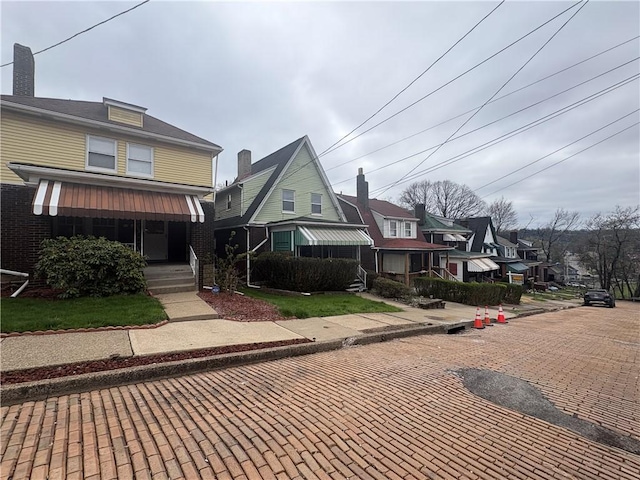 view of front of property with a residential view