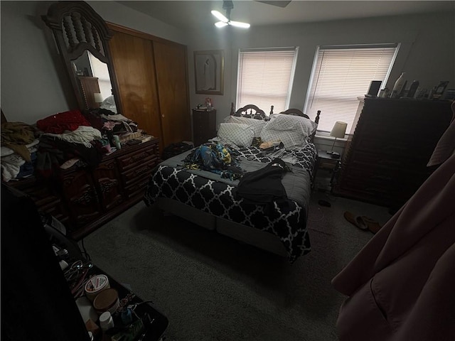 carpeted bedroom with a closet