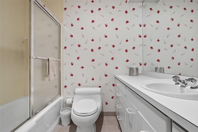 540 N Neville St Unit 402, Oakland, PA 15213 - bathroom featuring shower / bath combination with glass door, tile patterned flooring, vanity, and toilet