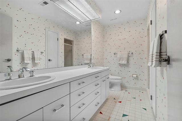 540 N Neville St Unit 402, Oakland, PA 15213 - bathroom with tile patterned floors, a sink, double vanity, visible vents, and wallpapered walls