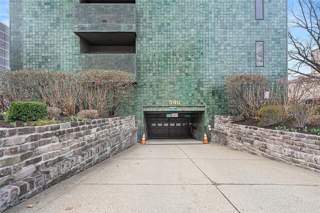 540 N Neville St Unit 402, Oakland, PA 15213 - exterior space featuring an attached garage and driveway