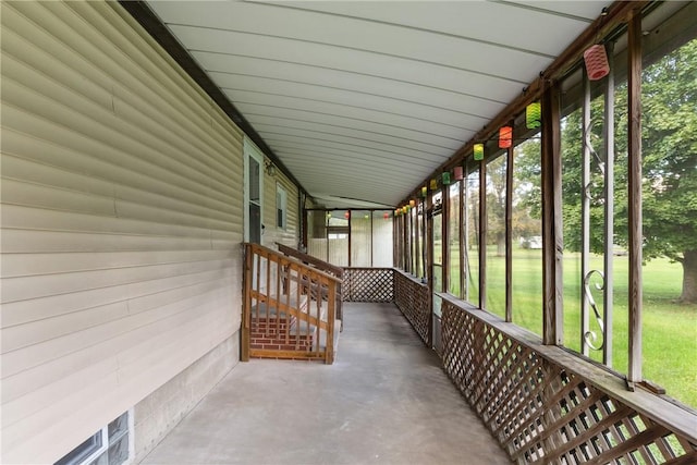 unfurnished sunroom featuring plenty of natural light
