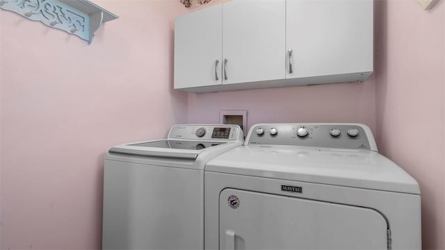 1420 Lexington Dr, Cecil, PA 15055 - clothes washing area featuring washer and dryer and cabinet space