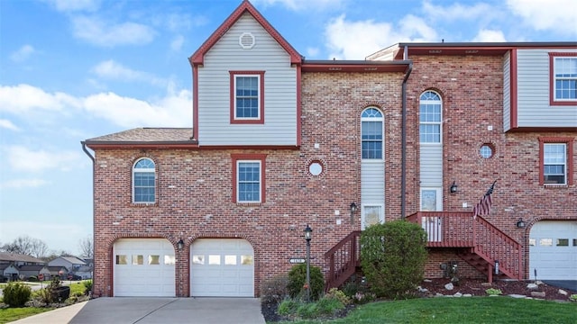 1420 Lexington Dr, Cecil, PA 15055 - townhome / multi-family property featuring concrete driveway, brick siding, and a garage