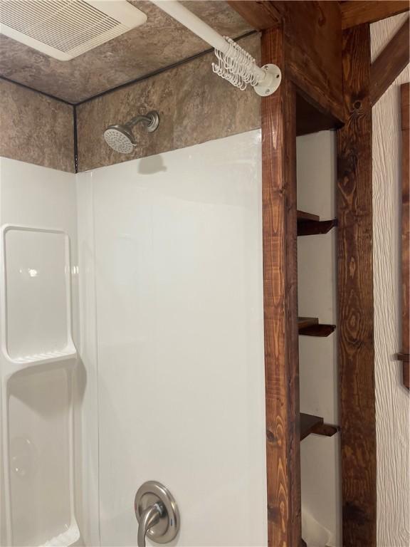 bathroom with a shower
