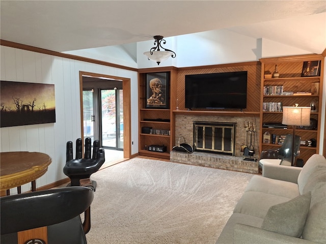 3619 Mccrady Rd, Churchill Boro, PA 15235 - living area featuring vaulted ceiling, carpet flooring, built in shelves, wood walls, and a brick fireplace
