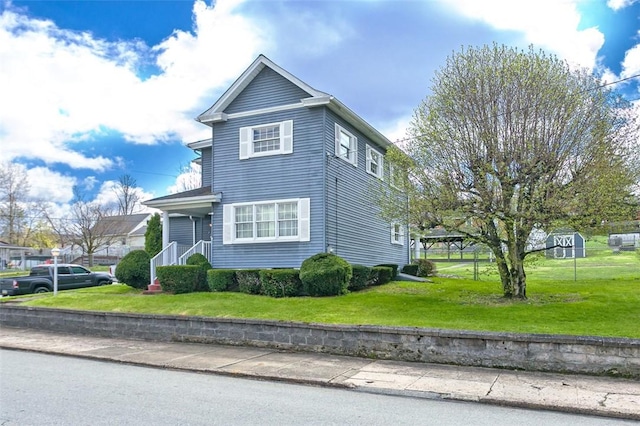 815 Franklin Ave, Connellsville, PA 15425 - view of front of property with a front lawn