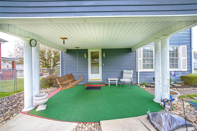 815 Franklin Ave, Connellsville, PA 15425 - view of patio / terrace with fence and a porch