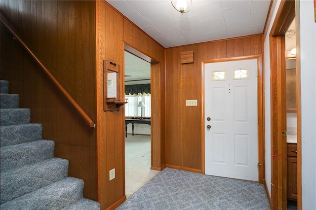815 Franklin Ave, Connellsville, PA 15425 - foyer entrance featuring wood walls, carpet, and stairway
