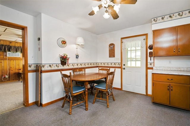 815 Franklin Ave, Connellsville, PA 15425 - dining space with baseboards, light colored carpet, and ceiling fan