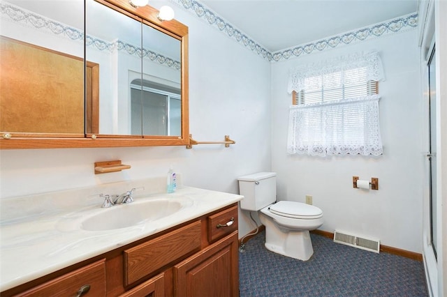 815 Franklin Ave, Connellsville, PA 15425 - bathroom with toilet, an enclosed shower, vanity, and visible vents