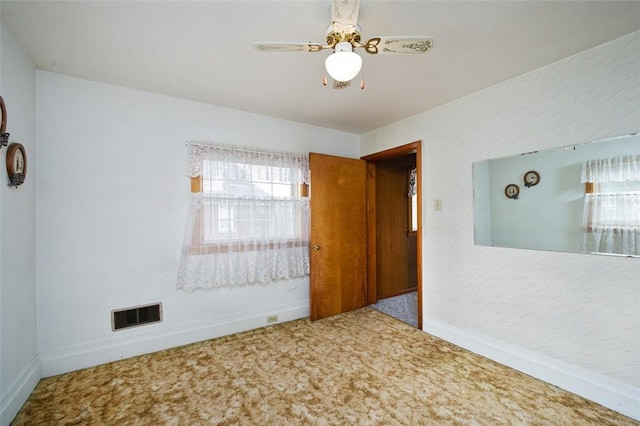 815 Franklin Ave, Connellsville, PA 15425 - spare room with baseboards, carpet flooring, and a healthy amount of sunlight