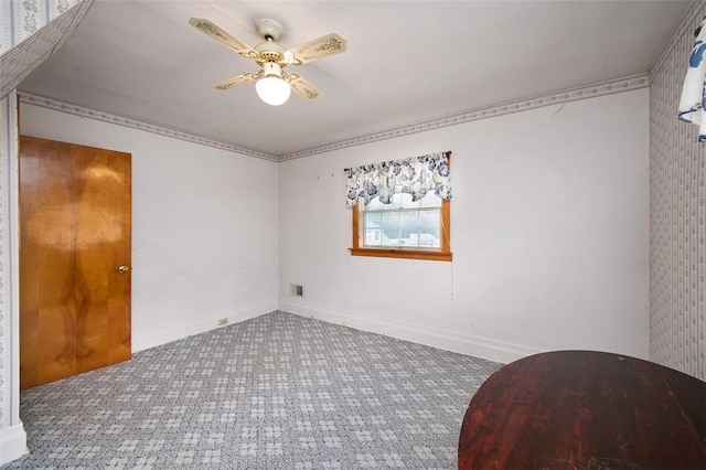 815 Franklin Ave, Connellsville, PA 15425 - carpeted spare room with ceiling fan and baseboards