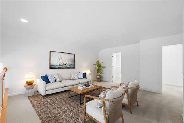 living area featuring baseboards, carpet flooring, and recessed lighting