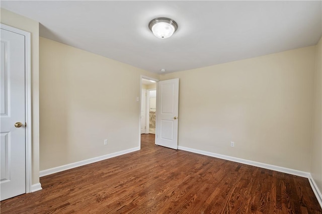 4203 Mckee Dr, Whitehall, PA 15236 - unfurnished bedroom with baseboards and wood finished floors