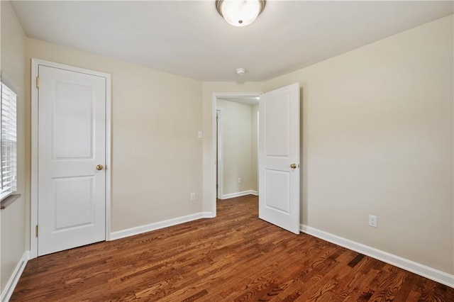 4203 Mckee Dr, Whitehall, PA 15236 - unfurnished bedroom featuring wood finished floors and baseboards