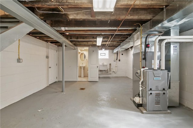 4203 Mckee Dr, Whitehall, PA 15236 - basement with heating unit and a sink