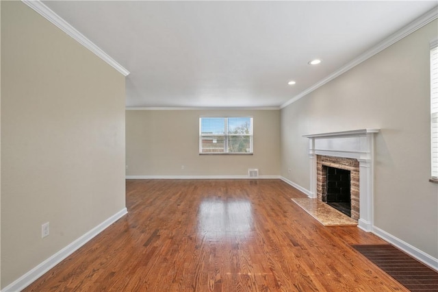 4203 Mckee Dr, Whitehall, PA 15236 - unfurnished living room featuring a fireplace with flush hearth, baseboards, wood finished floors, and visible vents