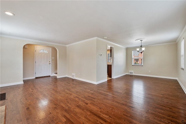 4203 Mckee Dr, Whitehall, PA 15236 - unfurnished living room featuring arched walkways, dark wood-type flooring, a chandelier, and visible vents