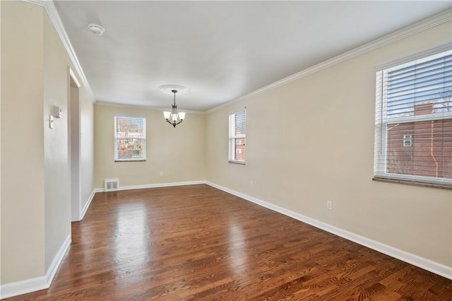 4203 Mckee Dr, Whitehall, PA 15236 - unfurnished room featuring visible vents, crown molding, dark wood-style floors, and a notable chandelier