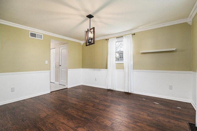 unfurnished dining area with crown molding, wood finished floors, and visible vents