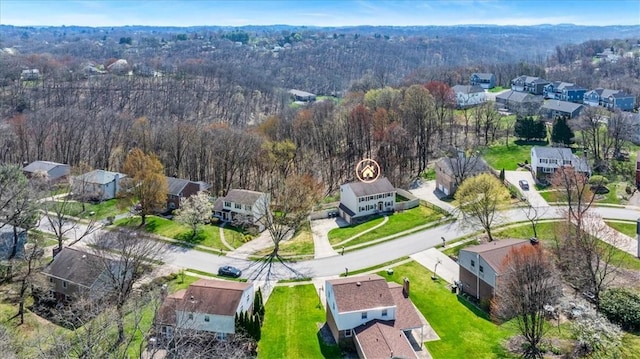 aerial view with a residential view and a forest view