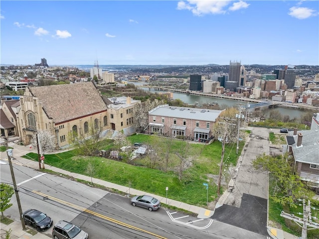 aerial view featuring a water view and a view of city