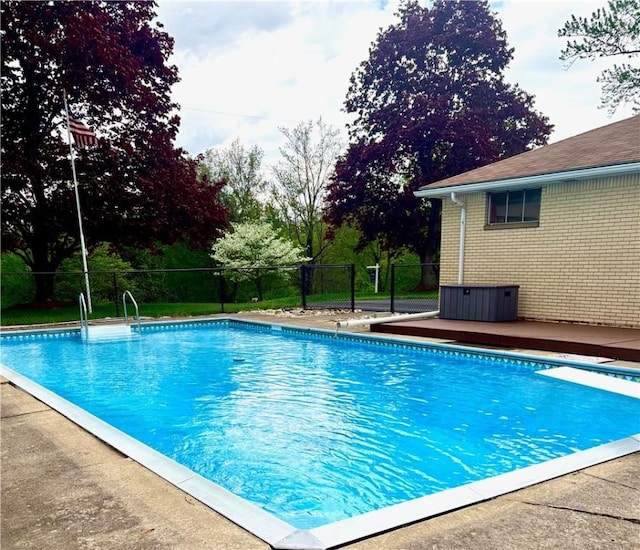 131 Porter Ln, Rochester Twp, PA 15074 - view of swimming pool featuring a diving board and fence
