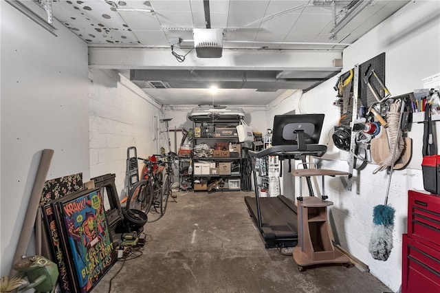 3125 Villawood Ave, Brentwood, PA 15227 - garage featuring concrete block wall and a garage door opener